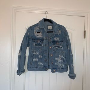 Distressed denim jacket